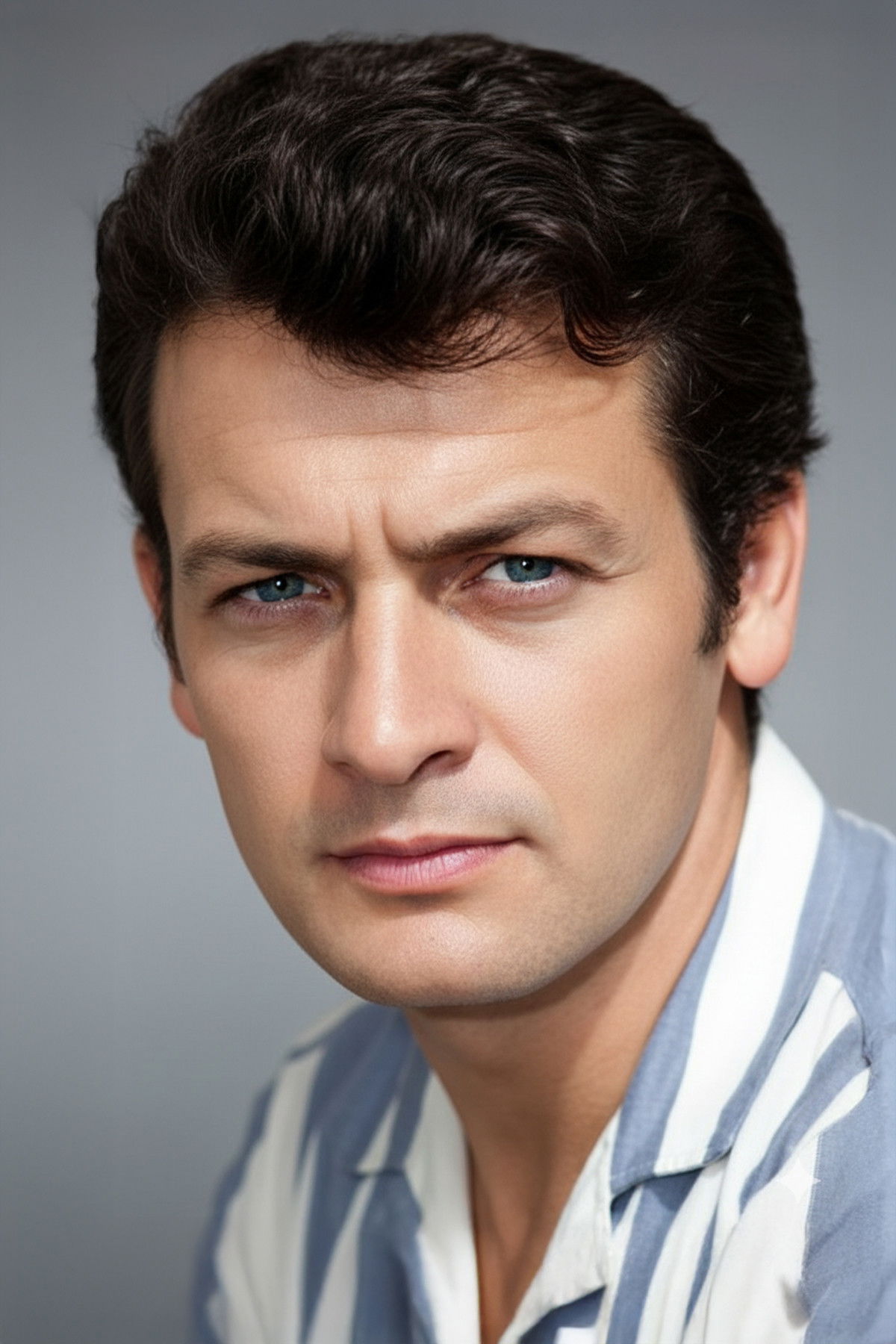 et billede af Tunç Oral