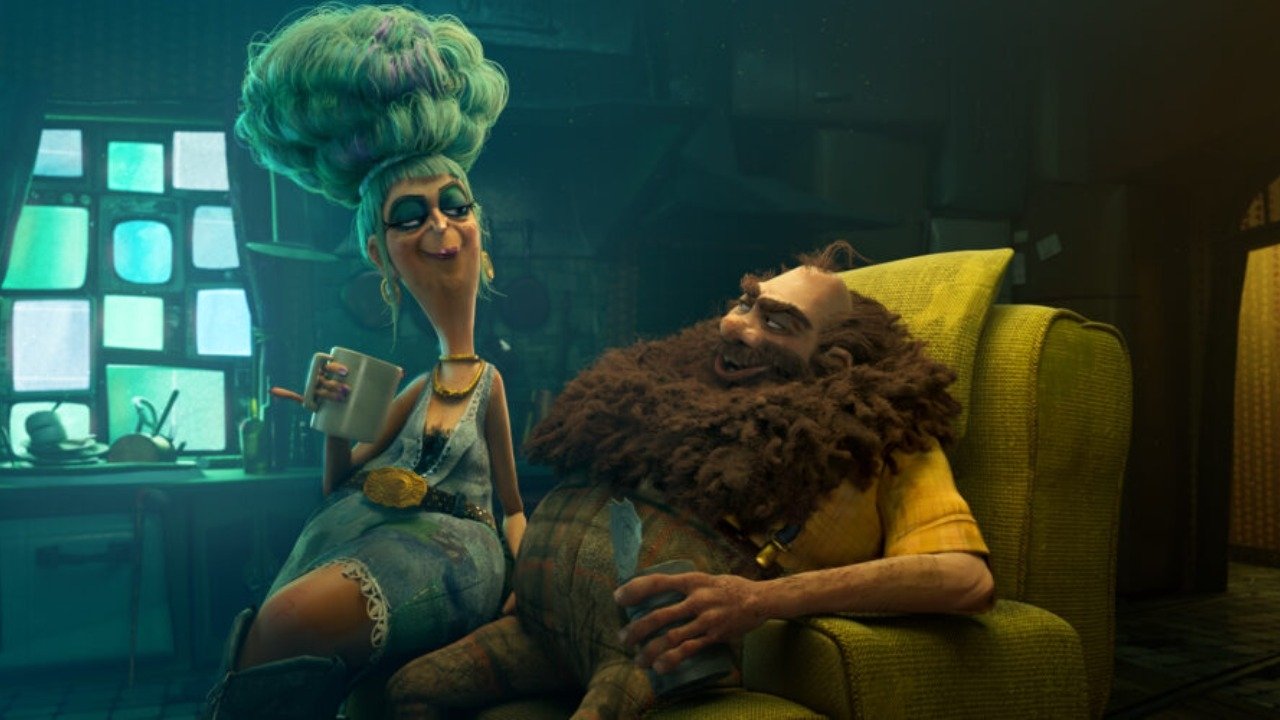 Caption: a man with a beard sitting next to a woman