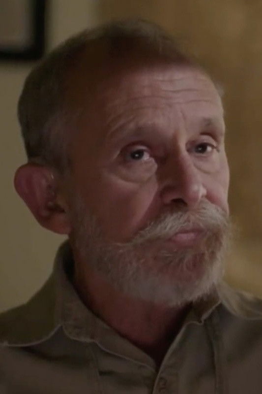 et billede af John Huber