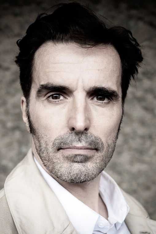 et billede af Guy Combes