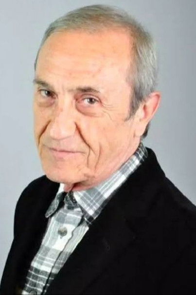 et billede af Yaman Tüzcet