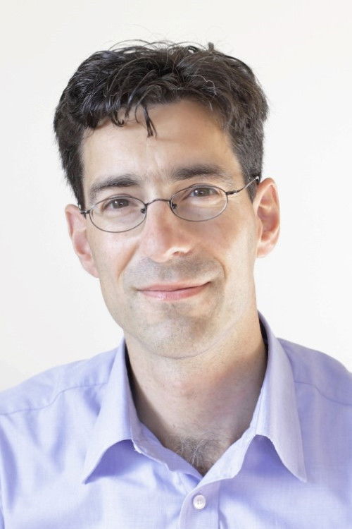 et billede af Dr. Reto Eberhard Rast