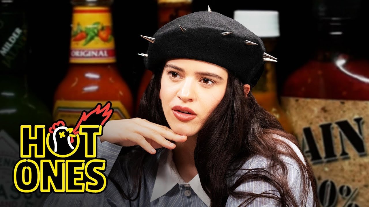 Rosalía Can't Stop Laughing While Eating Spicy Wings