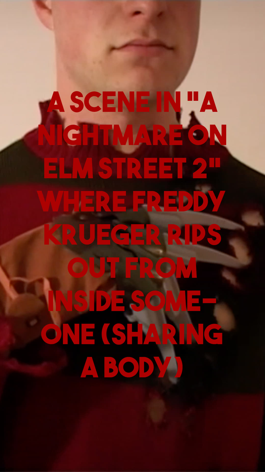 A scene in “A Nightmare on Elm Street 2” where Freddy Krueger rips out from inside someone (sharing a body)