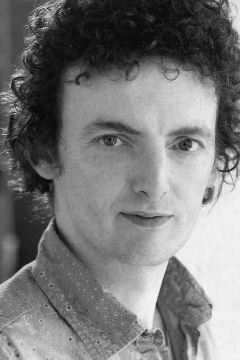 et billede af John Keating