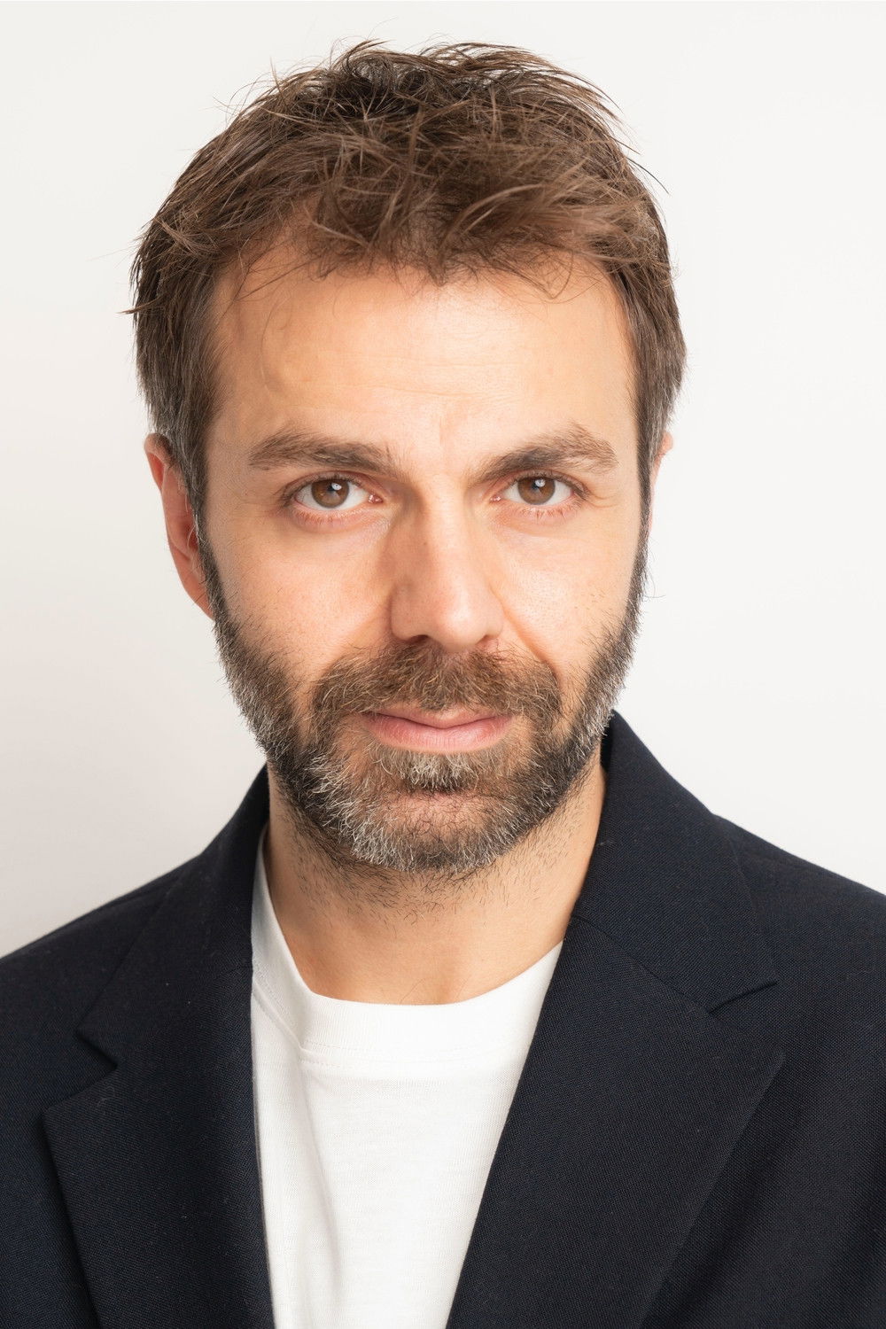 et billede af Aziz Caner İnan