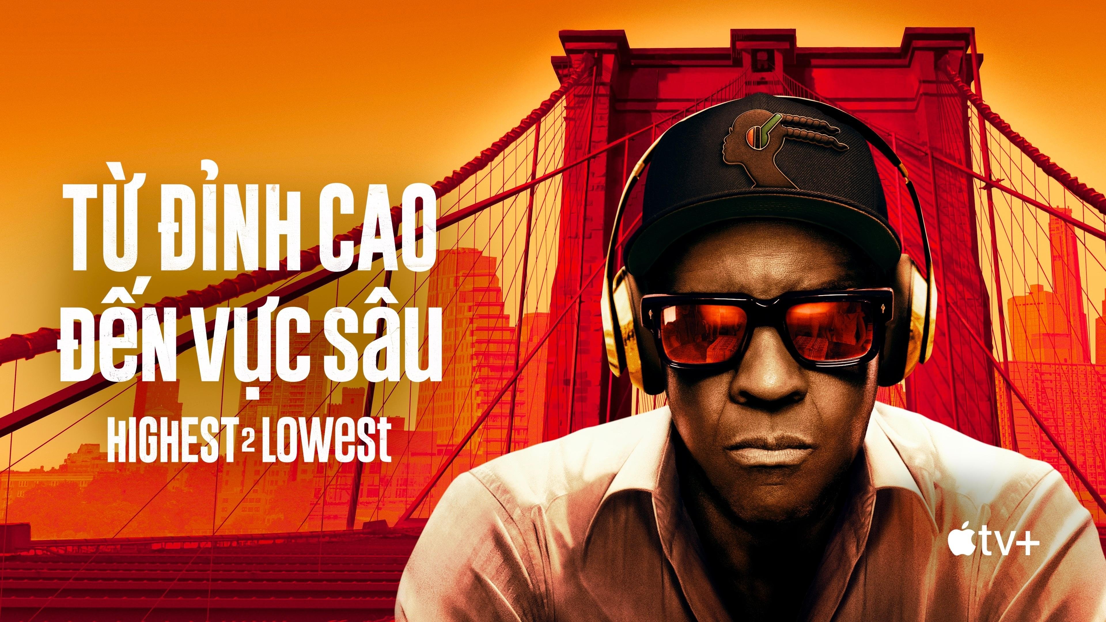 Caption: a man wearing headphones and a hat