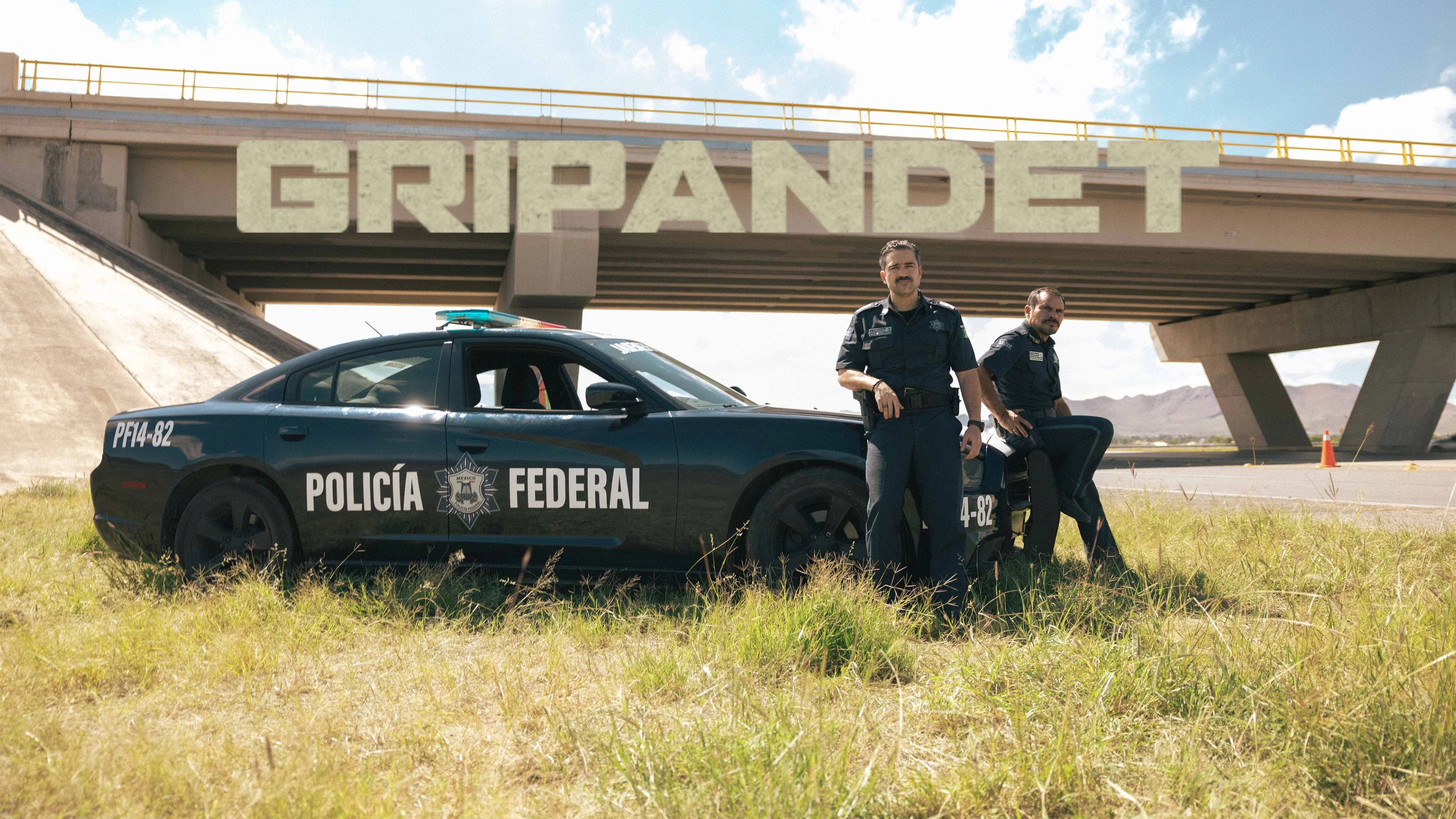 Facing El Chapo backdrop