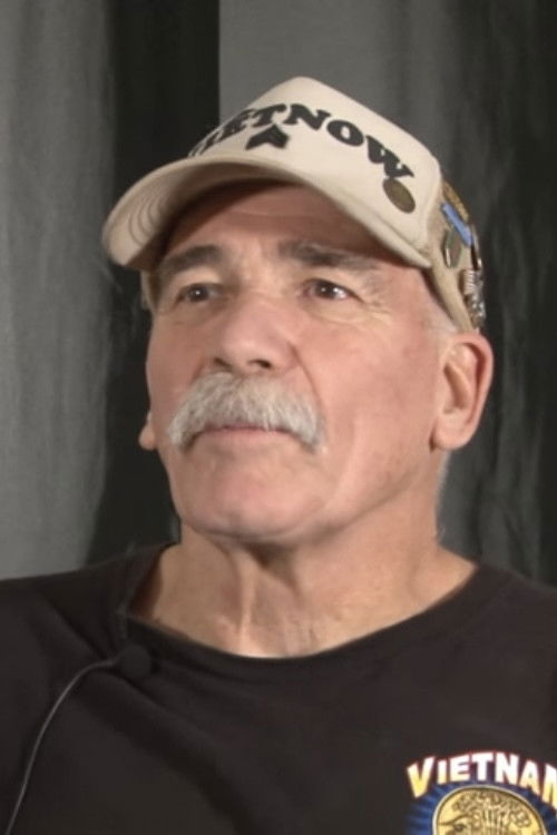 et billede af John Tuttle