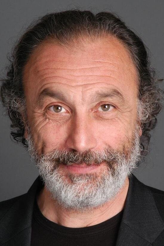 Enrico Di Giovanni's picture in the cast