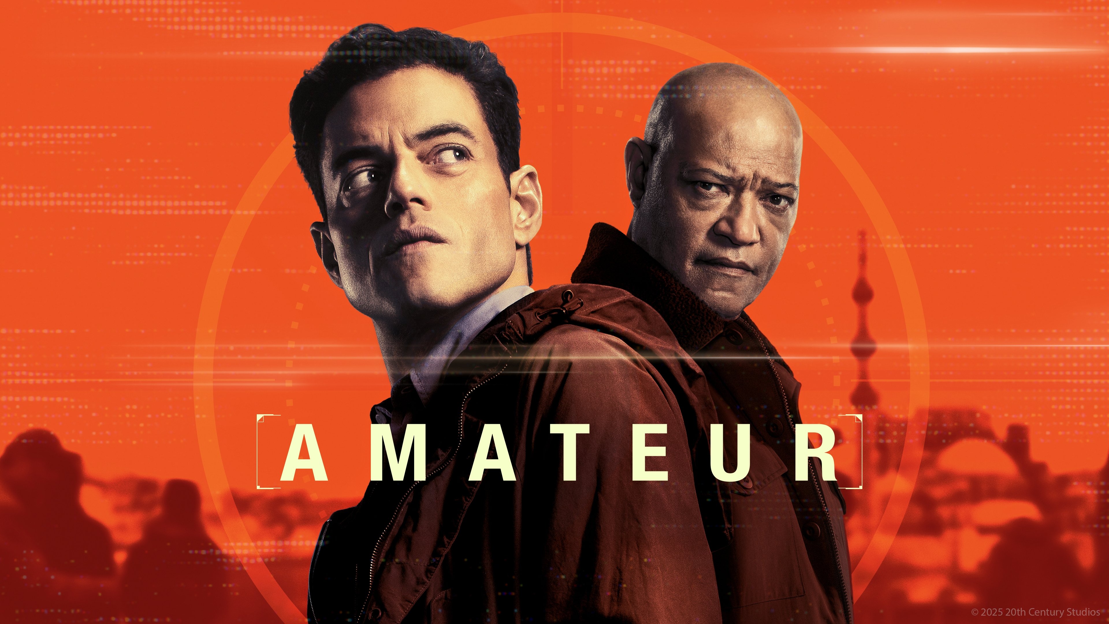Caption: two men standing next to each other in front of an orange background