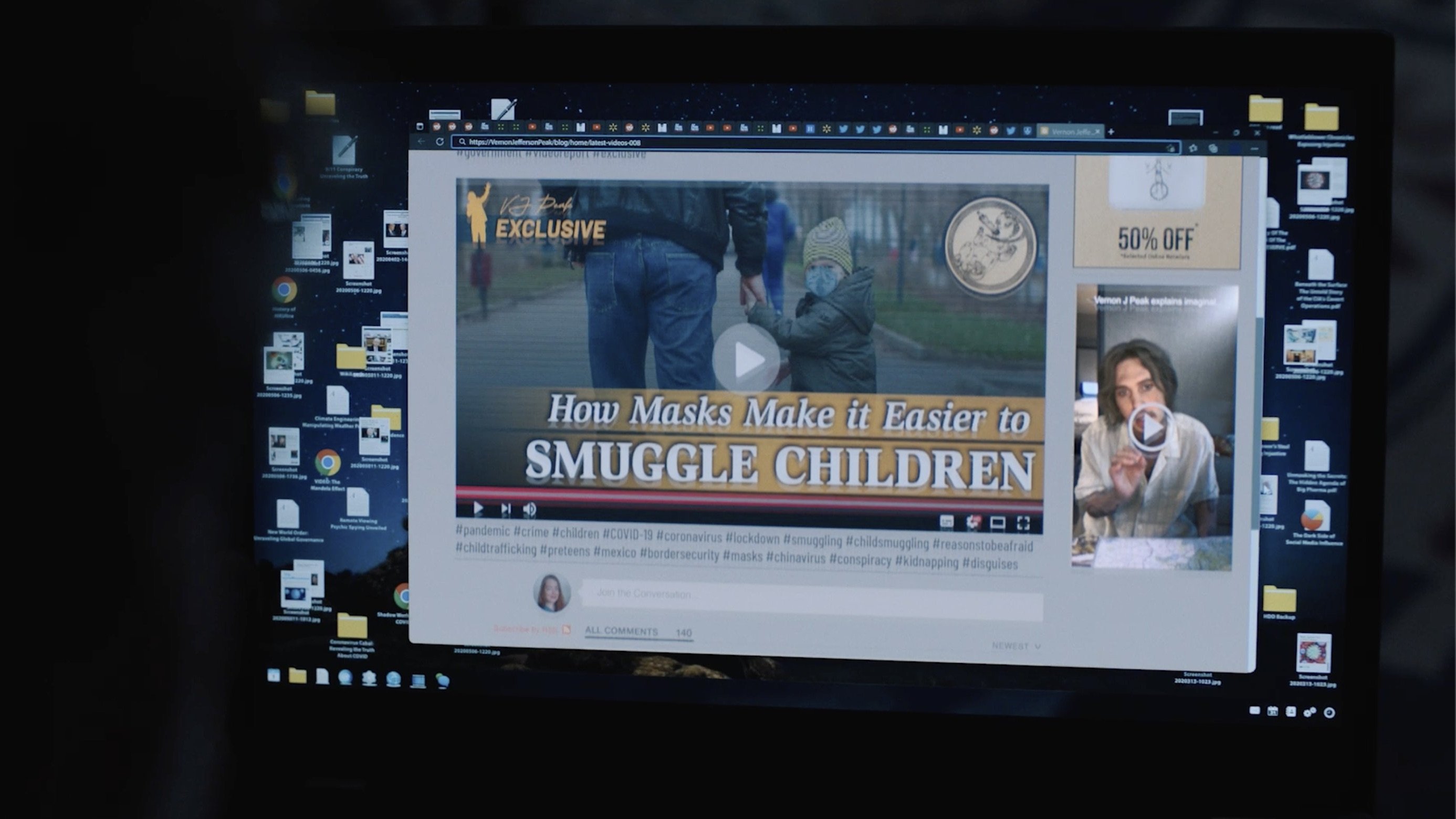 Caption: a computer screen with a picture of a man on it
