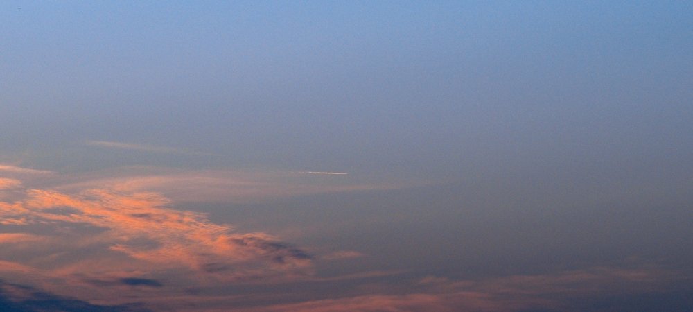 Backdrop of Paragliders