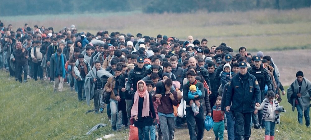 Backdrop of Born in Syria