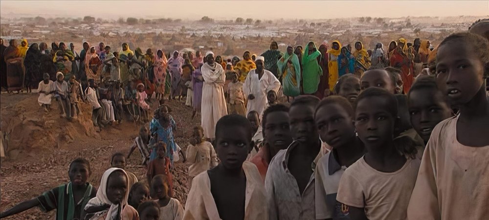 Backdrop of Darfur Now