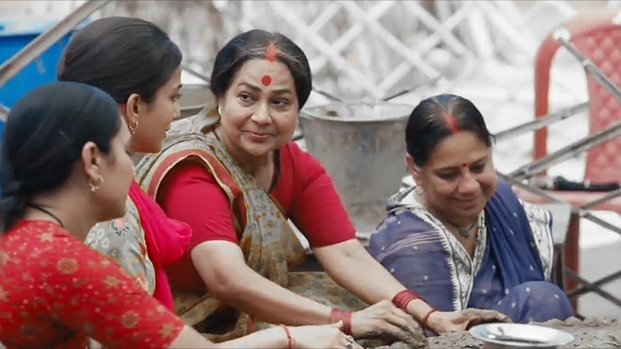 Ganga builds a communal stove