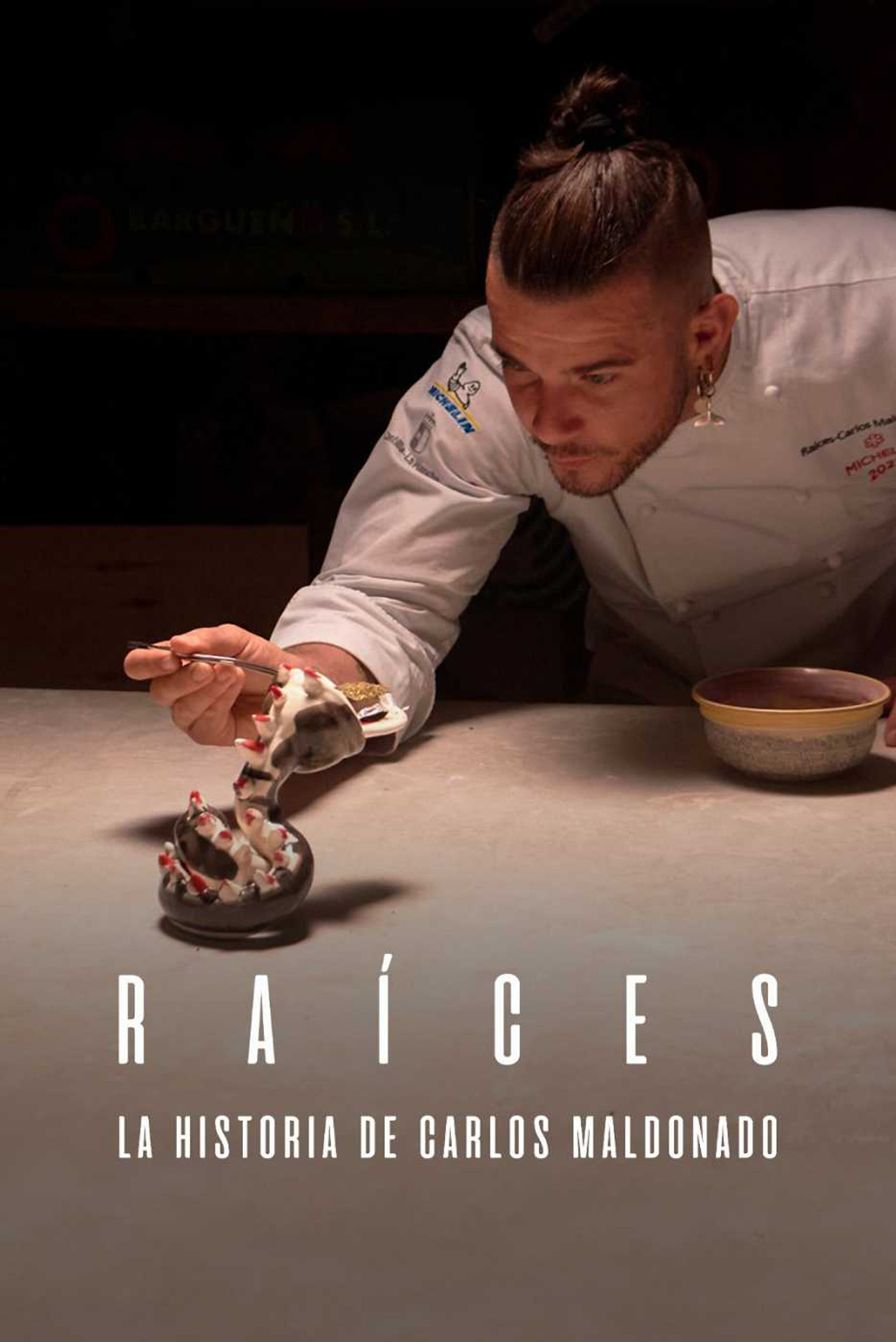 Raíces, historia e Carlos Maldonado backdrop