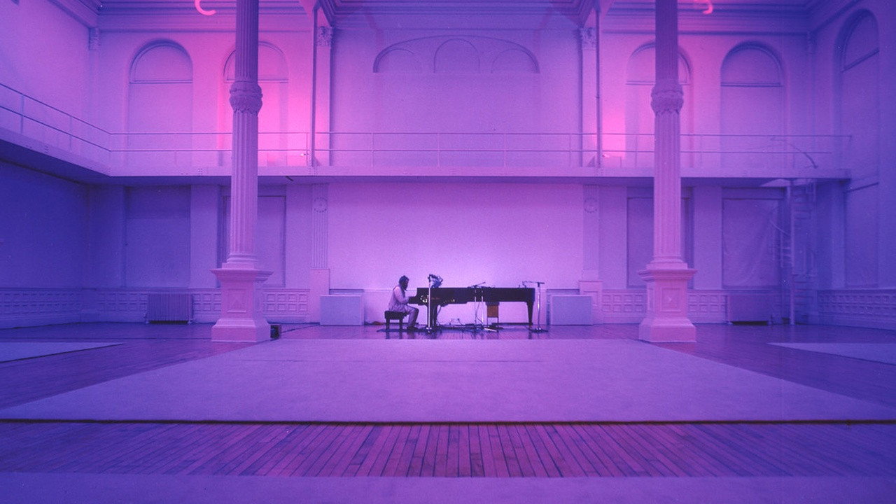 The Well-Tuned Piano in the Magenta Lights still 2