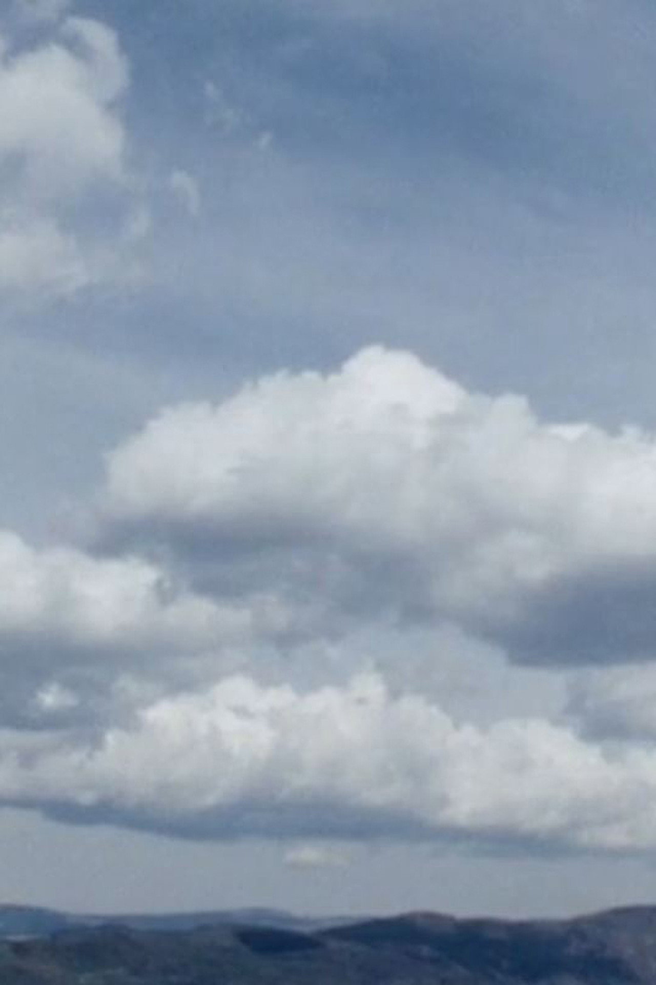 Hilltop With Clouds