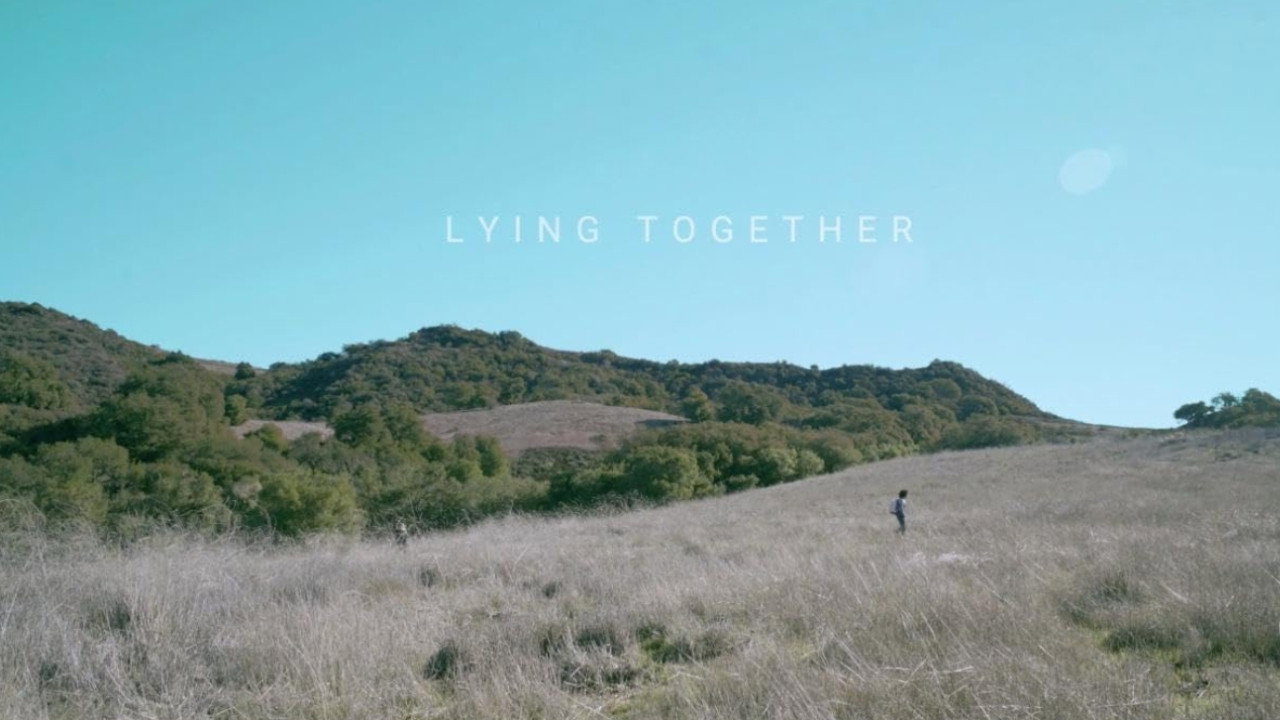 Lying Together backdrop