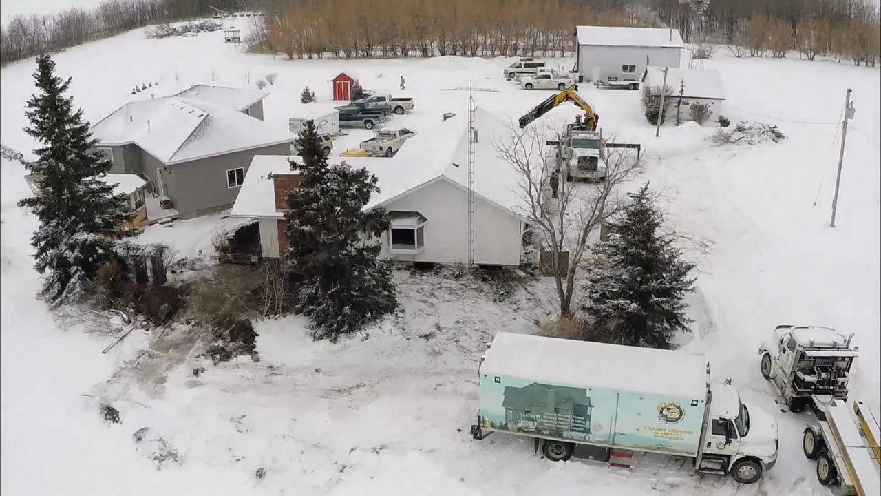 Déménageurs de maisons — Une cheminée de 4 tonnes