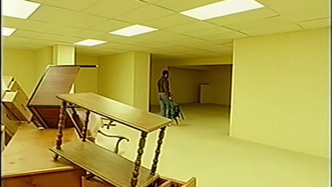 Cinematic still from the movie Backrooms