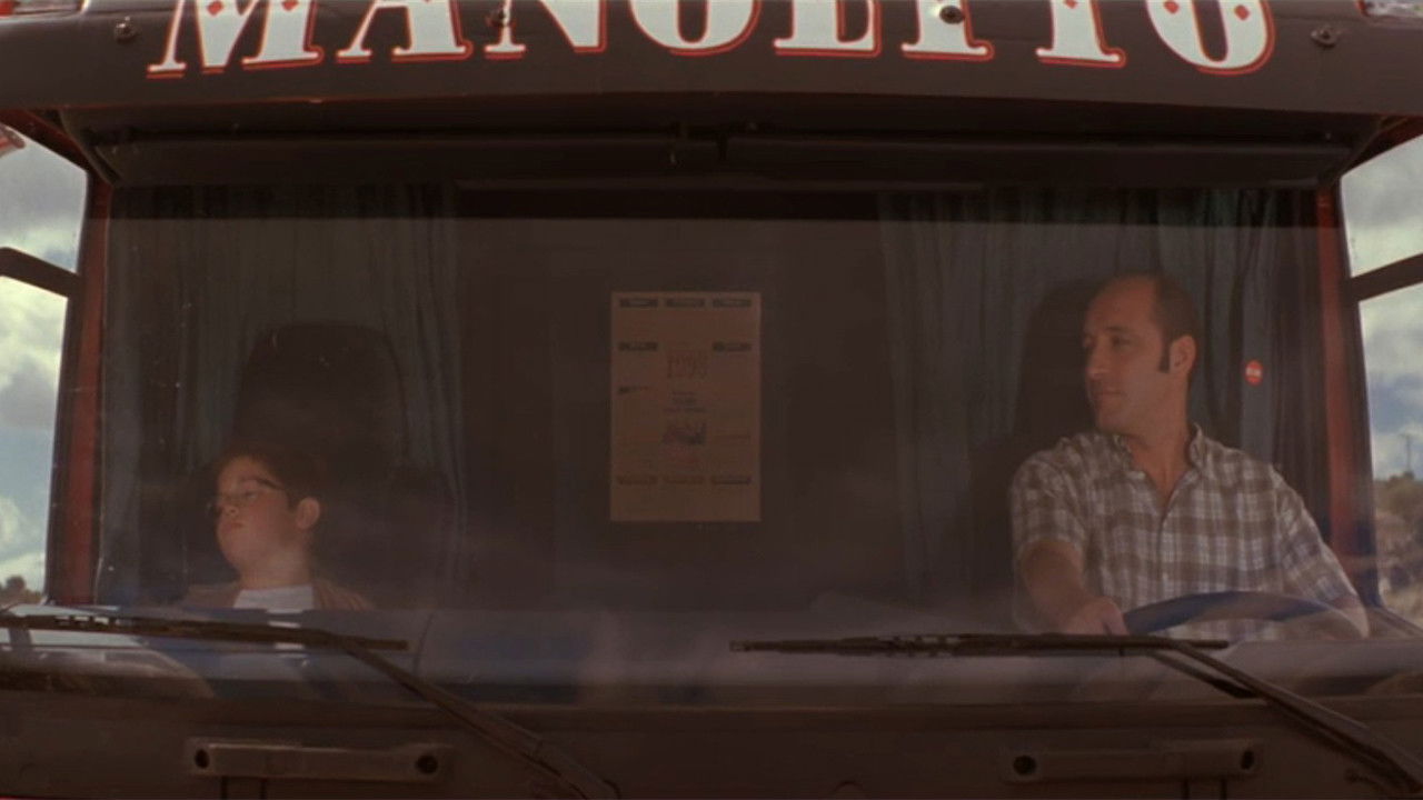 Manolito Four Eyes backdrop