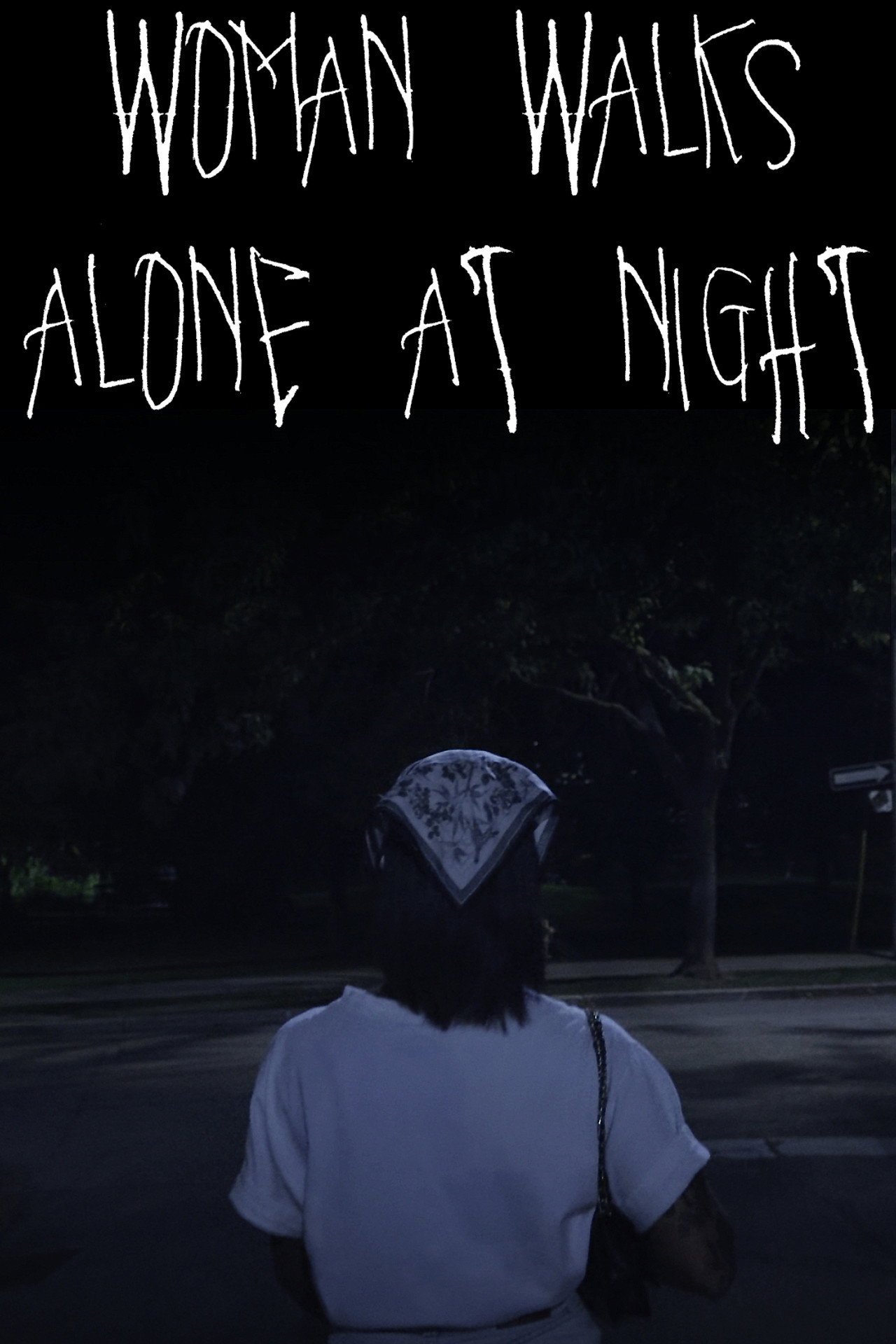 WOMAN WALKS ALONE AT NIGHT
