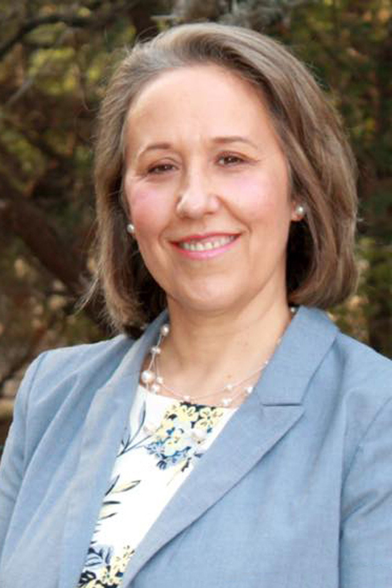 Dr. Christine Mann
