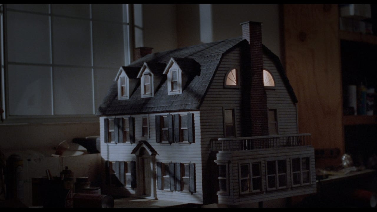 Amityville: Dollhouse Backdrop Image