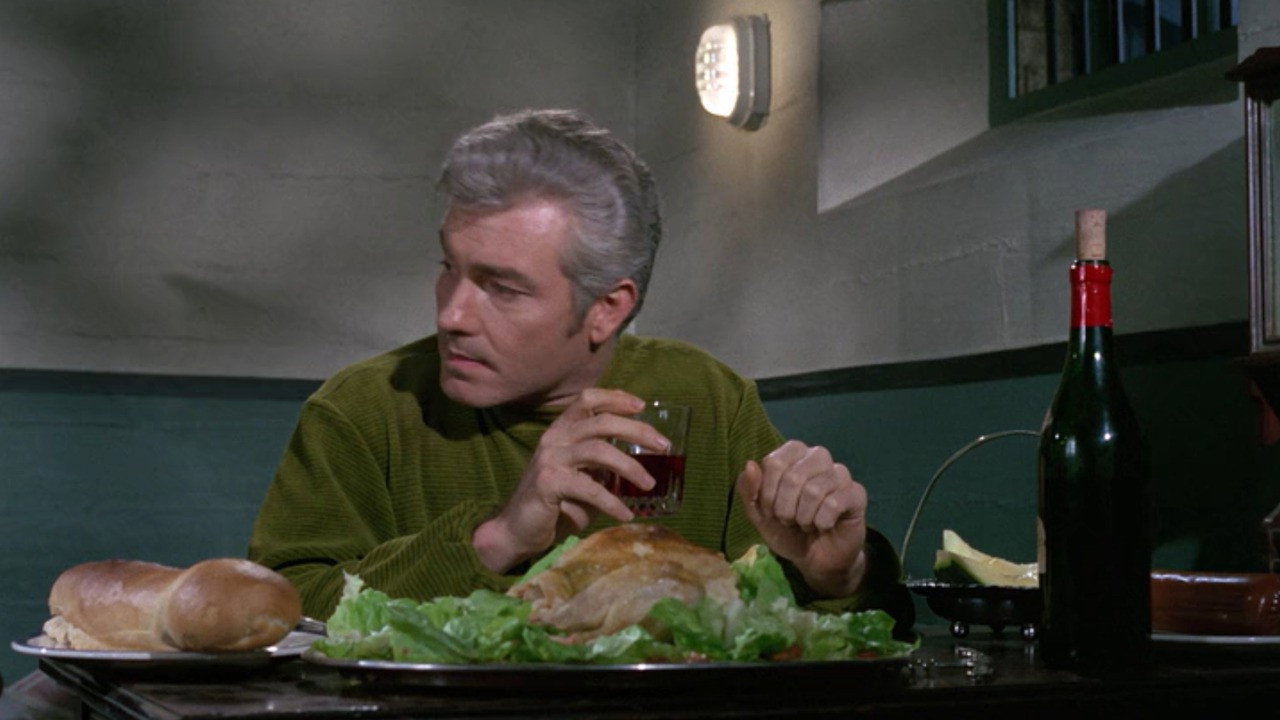 Man in a Suitcase backdrop