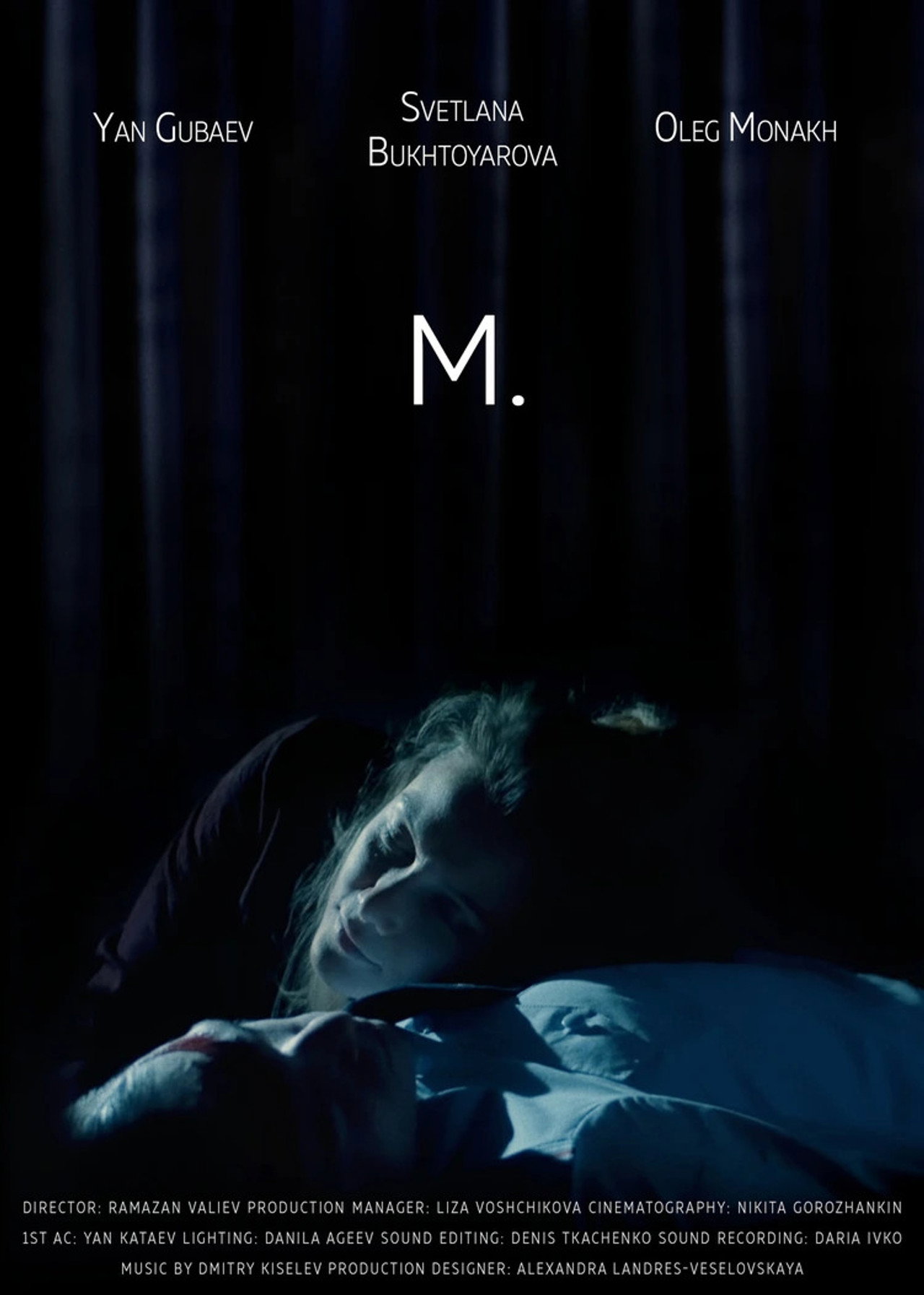 M.