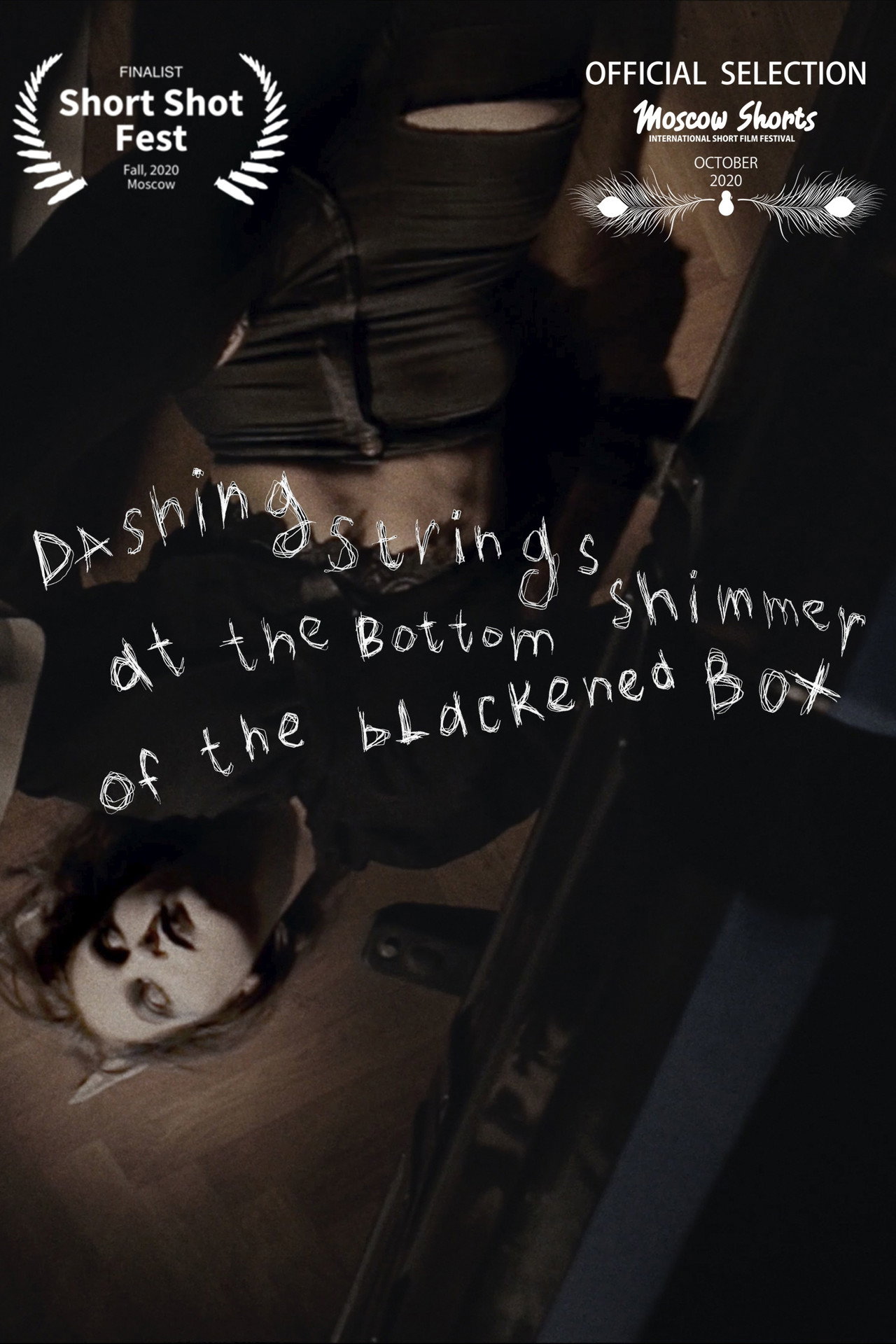 Dashing Strings Shimmer at the Bottom of the Blackened Box Backdrop