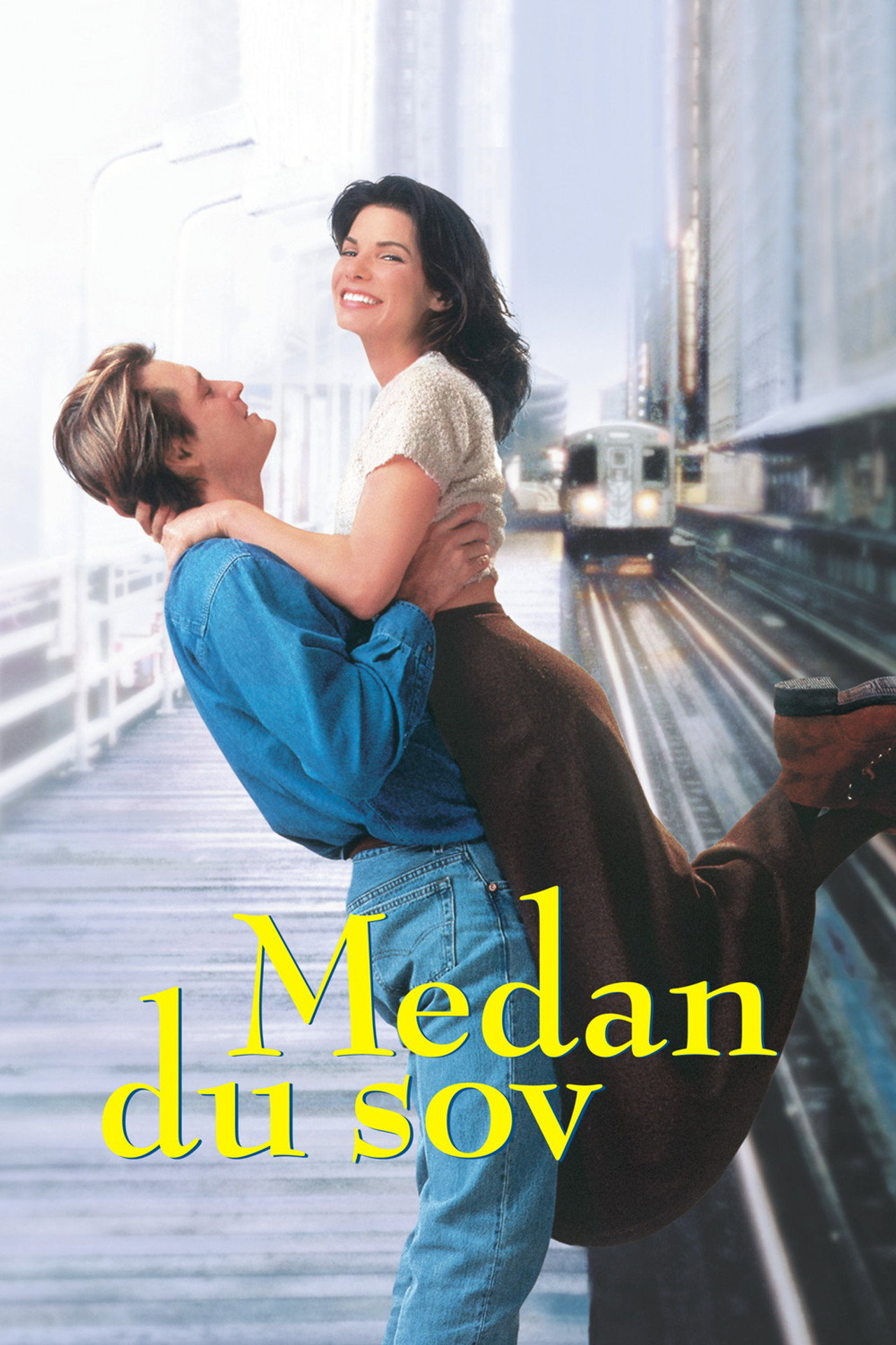 Medan du sov filmaffisch