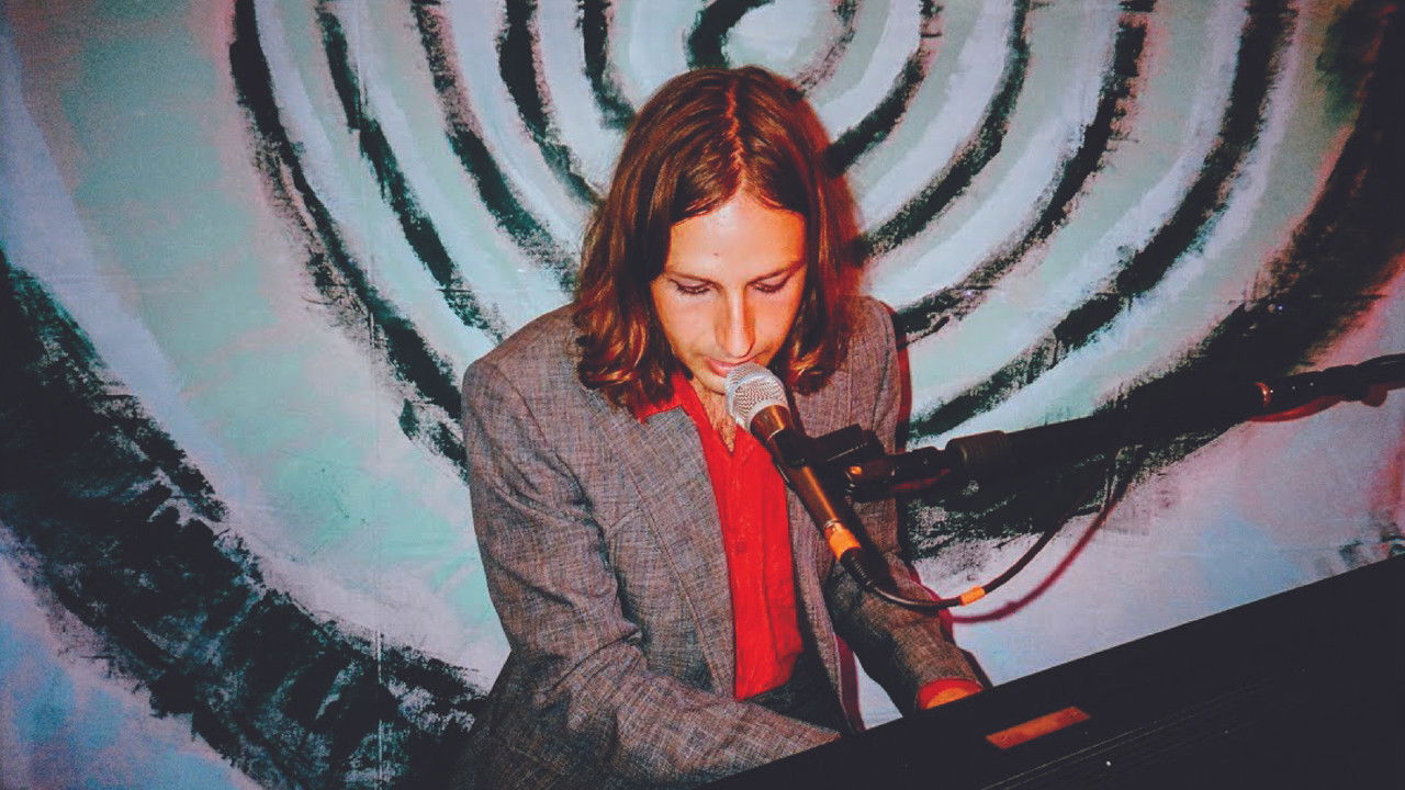 Gjueti Jeteve: Filmi i Koncertit të Drejtë backdrop