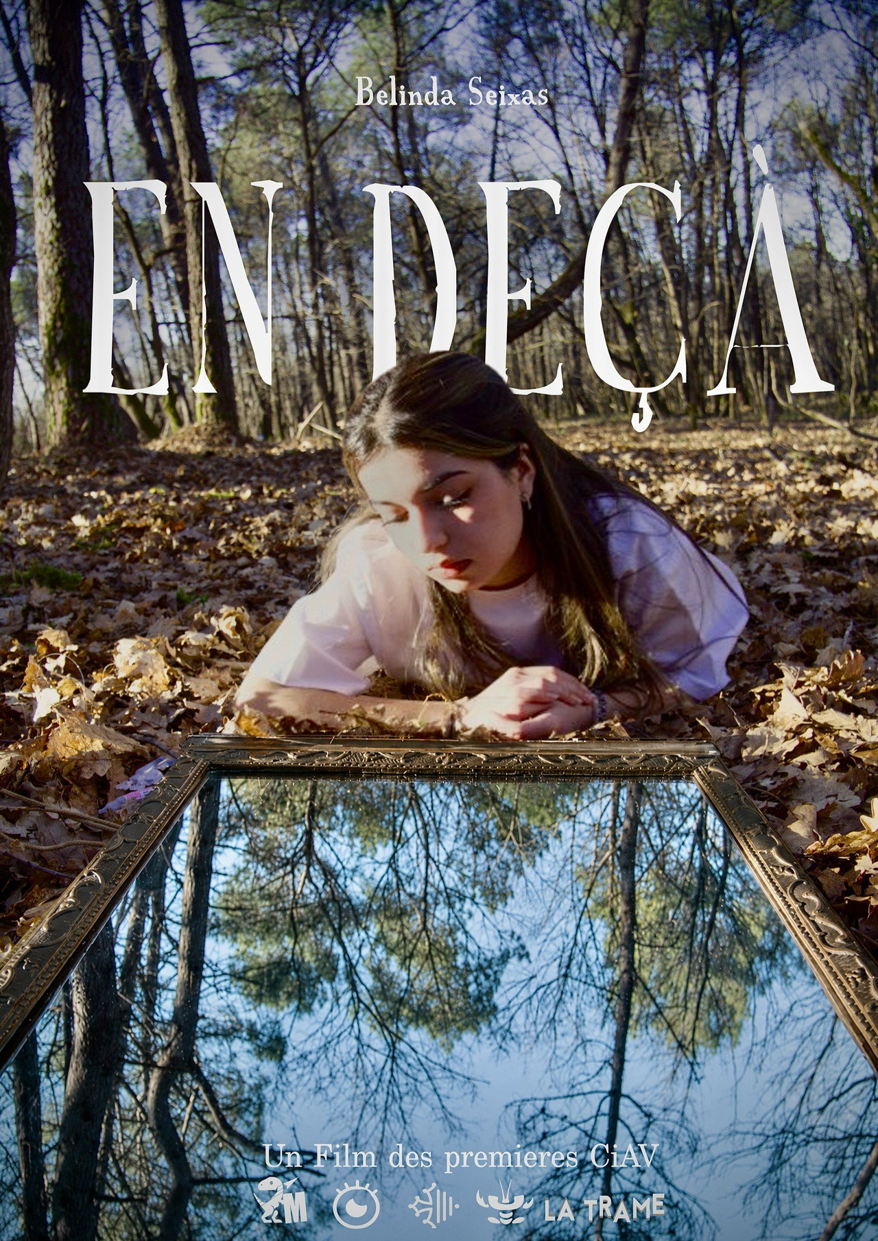 En-deçà