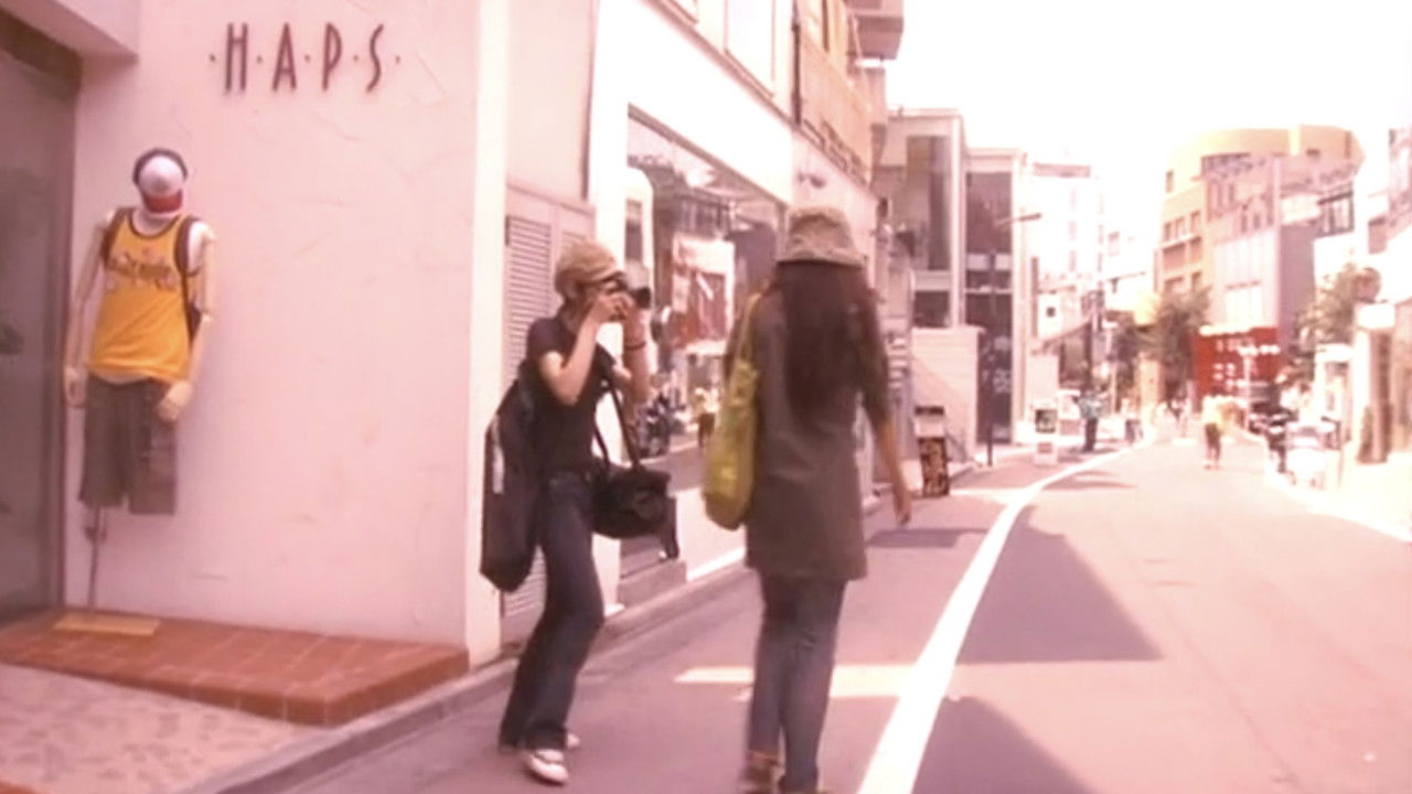 Girlfriend: Someone Please Stop the World backdrop