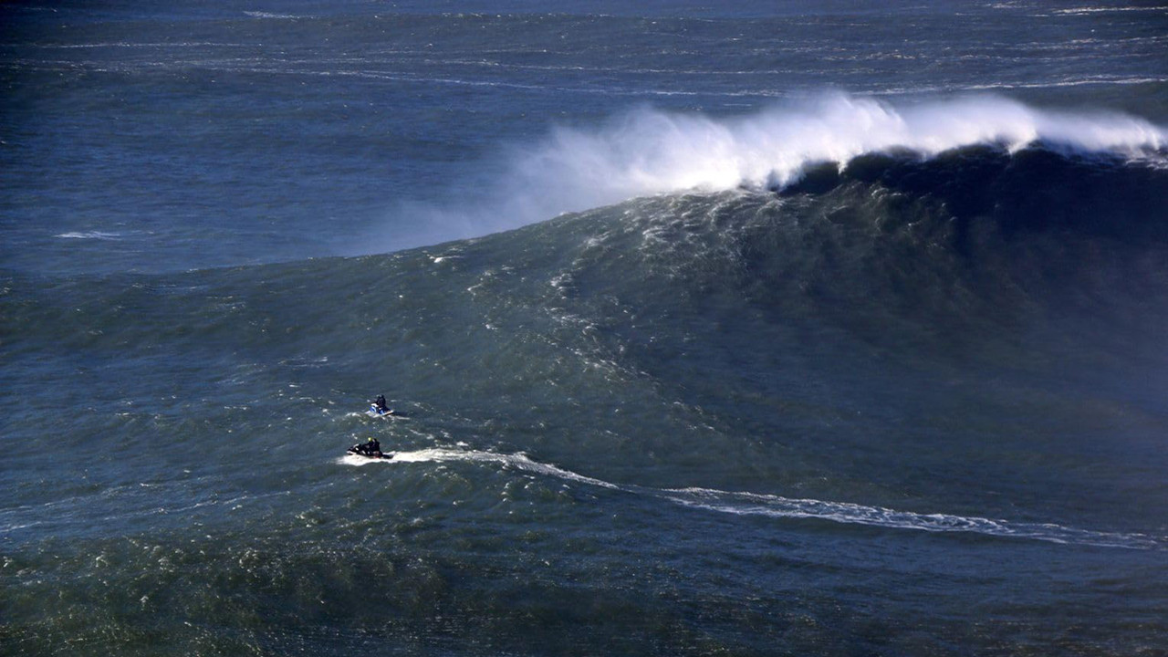 The Perfect Wave: Big Wave Surfing in Portugal backdrop