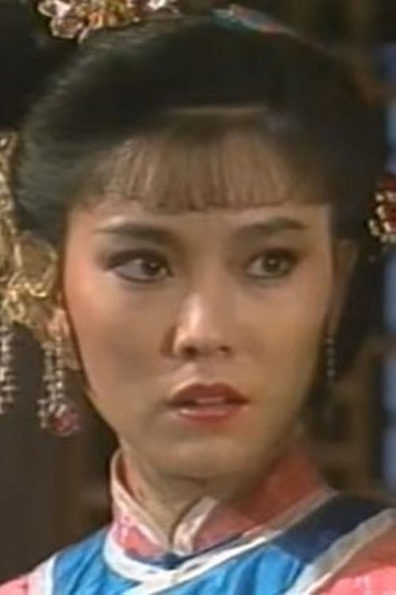 官晶华