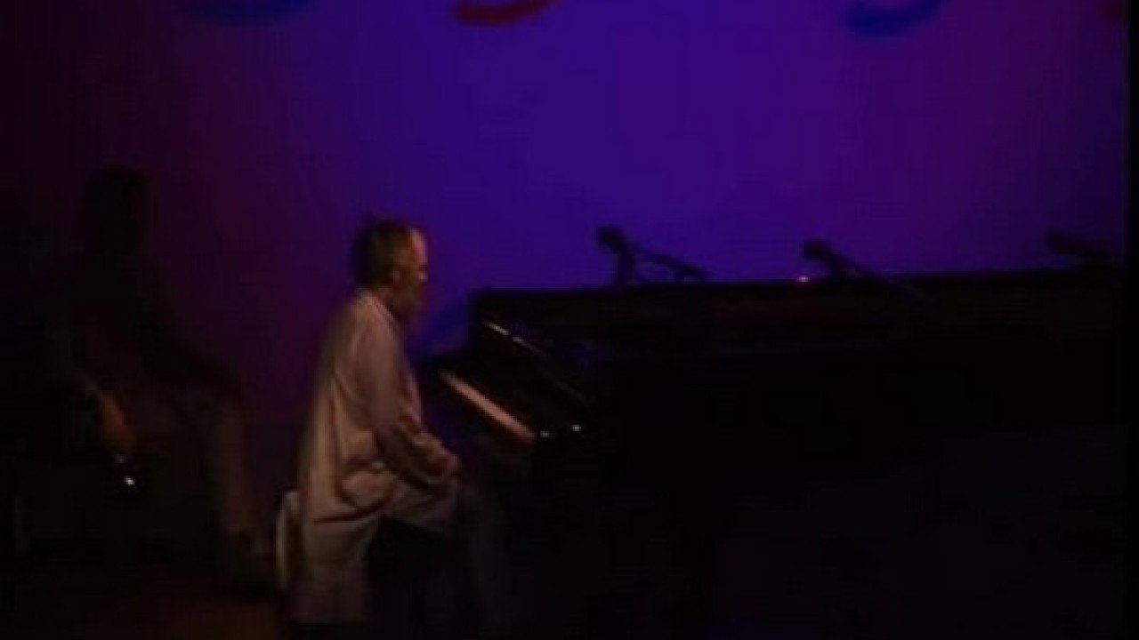 The Well-Tuned Piano in the Magenta Lights