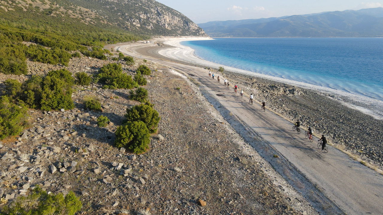 Pedaling in Disappearing Waters backdrop