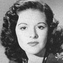Beverly Lloyd als Cigarette Girl