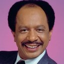 Sherman Hemsley als Reverend Mike