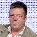 Bruce Toms als Kane Fisher