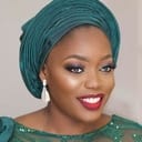 Aiyeola Bisola als Chef Simbi