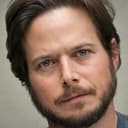 Scott Wolf als Greg Scanton