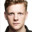 Patrick Gibson als Robert Q. Gilson