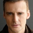 Callum Blue als Caroline's Husband (voice)