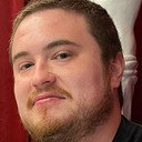 Alex Rochon als Caine (voice)