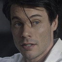 Smith Craig als American Researcher
